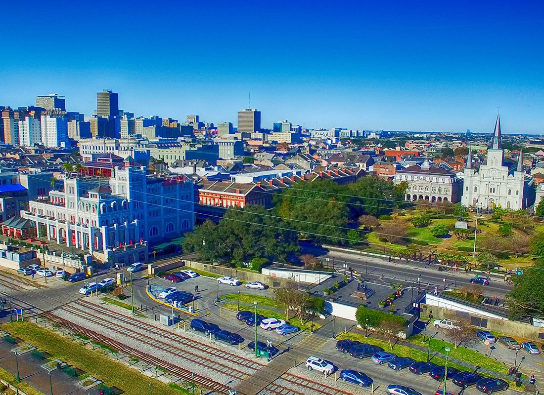 Metairie LA - Aerial View of Commercial Buildings Parking Lots and Railroad Tracks in Downtown Metairie Louisiana on a Sunny Day